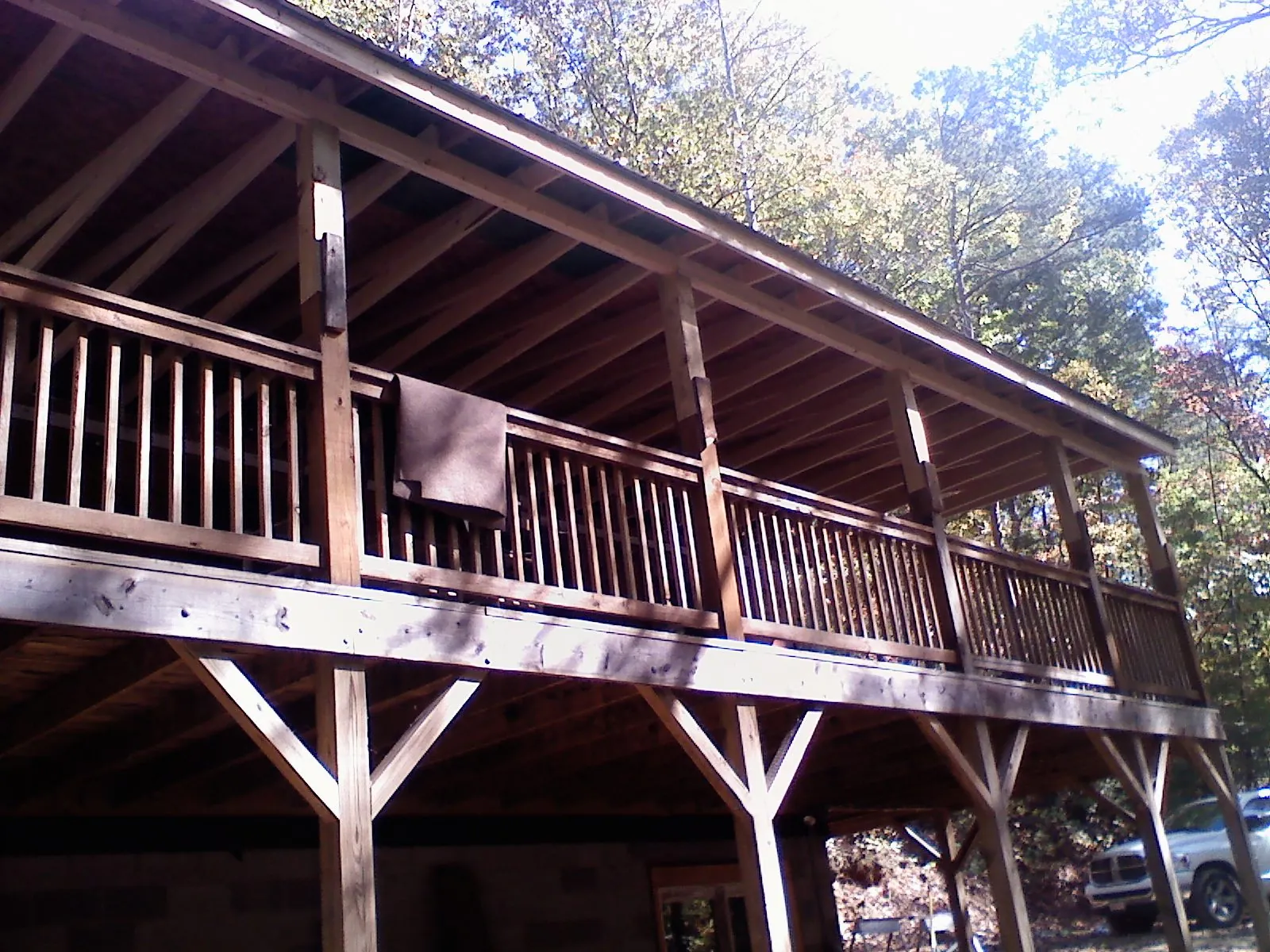 Timber framing under a new elevated porch and deck — Roof Leak Repair in Normangee by Roofing Brothers